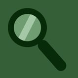 A dark green magnifying glass on a green background.